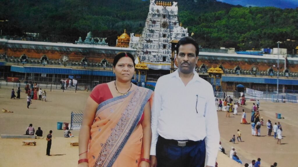 A photosuit infront of tirupati balaji mandir.