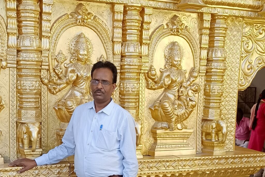 standing near outside of golden temple.
